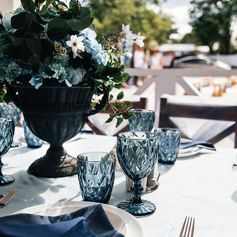 blue-glasses-plates-and-utensils-on-a-festive-tab-2025-01-08-04-18-35-utc copy